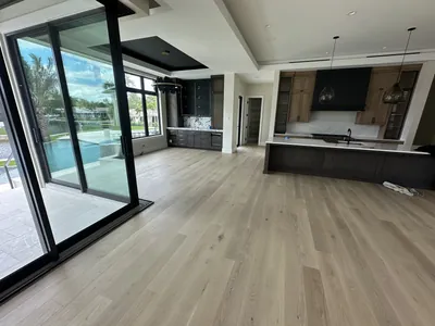 Hardwood herringbone flooring in a Tampa Bay hallway